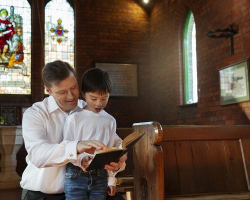 medium-shot-christian-kid-man-reading-bible